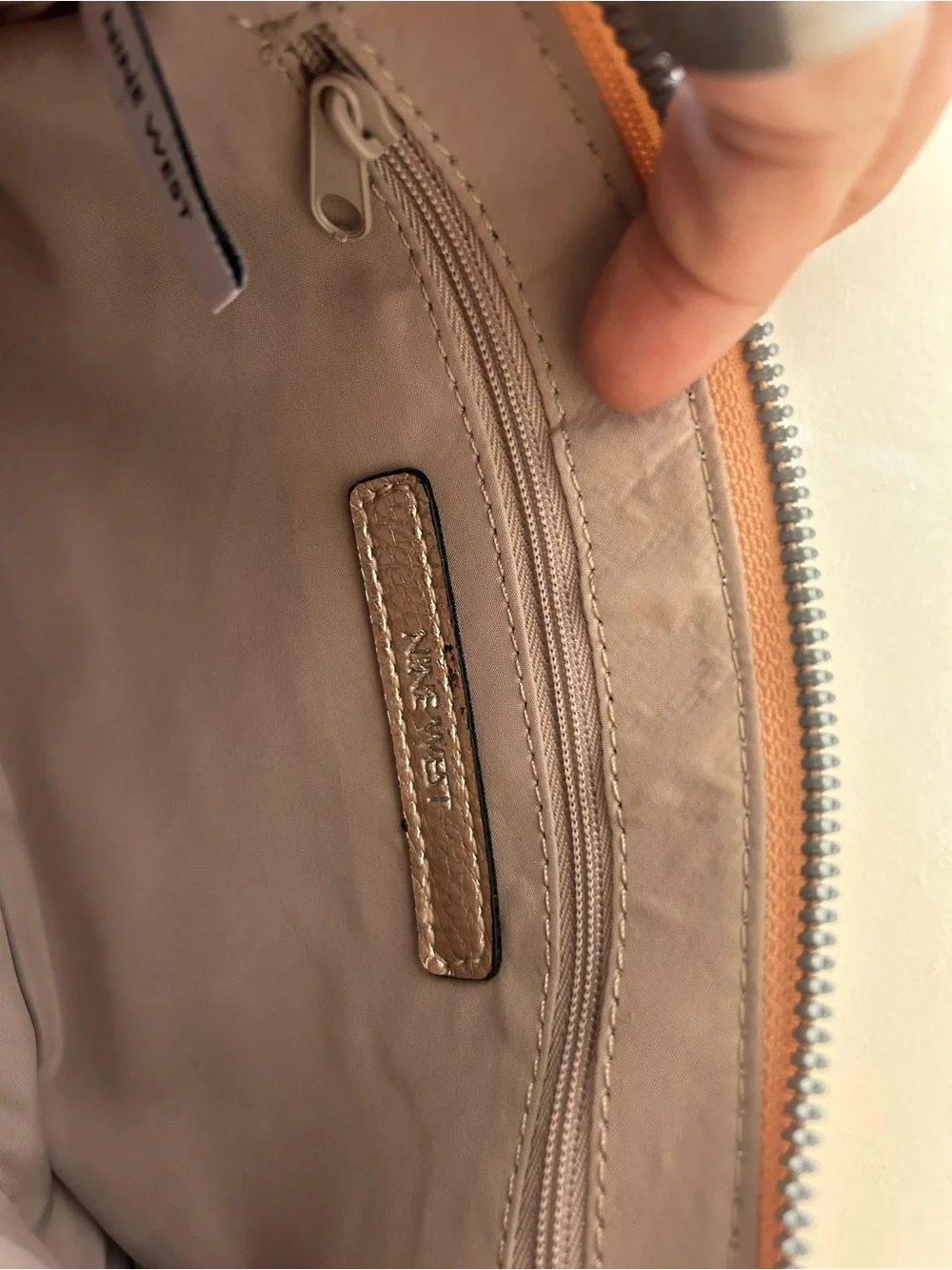Nine West Metallic Rose Gold Wristlet